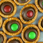 Hersey Kiss Pretzels are a favorite holiday treat.  These simple Pretzel Kiss Candies are incredibly easy to make and always a hit with family and friends.  