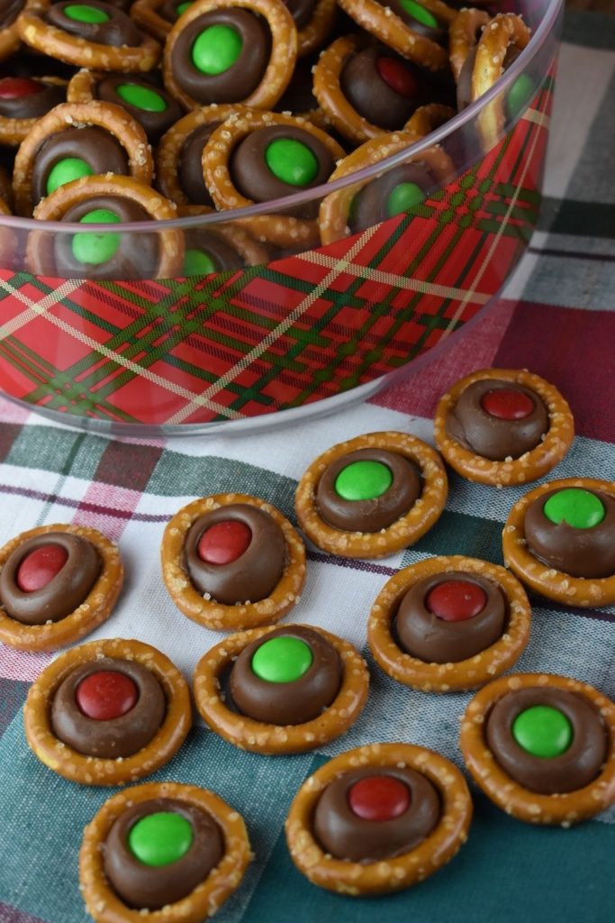 Hersey Kiss Pretzels are a favorite holiday treat.  These simple Pretzel Kiss Candies are incredibly easy to make and always a hit with family and friends.  