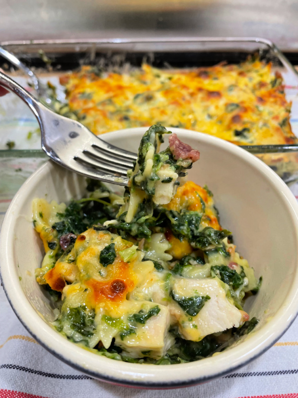 Chicken and Spinach Pasta Casserole is a hearty, cheesy dish easily made for a weeknight dinner.