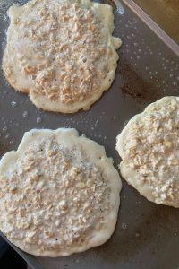 Easy Swedish Oatmeal Pancakes are great for a quick breakfast or supper. Truth be told, we like these old fashioned pancake recipe as a dessert rolled up with a dollop of peanut butter or your favorite preserves. 
