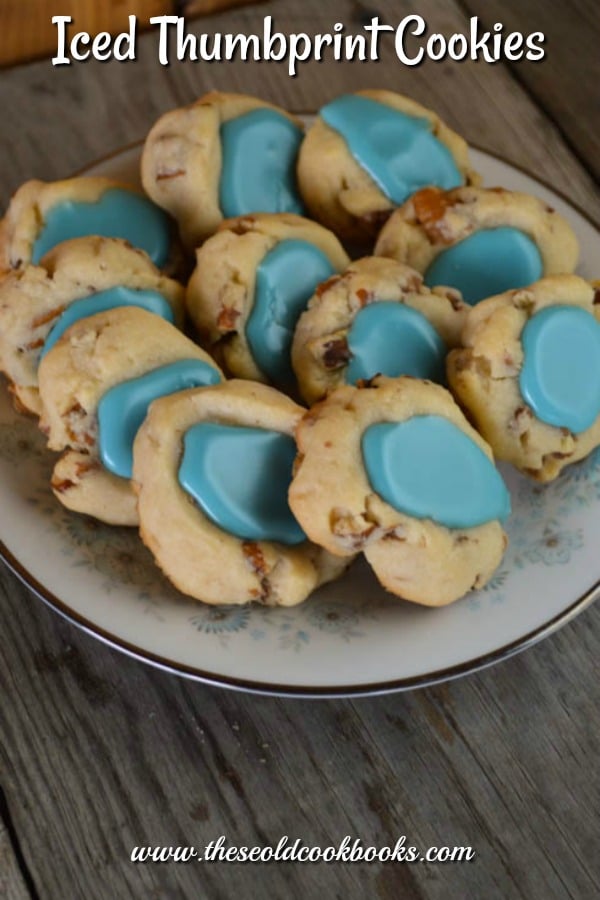 Iced Thumbprint Cookies with nuts are the perfect dessert for any special occasion.