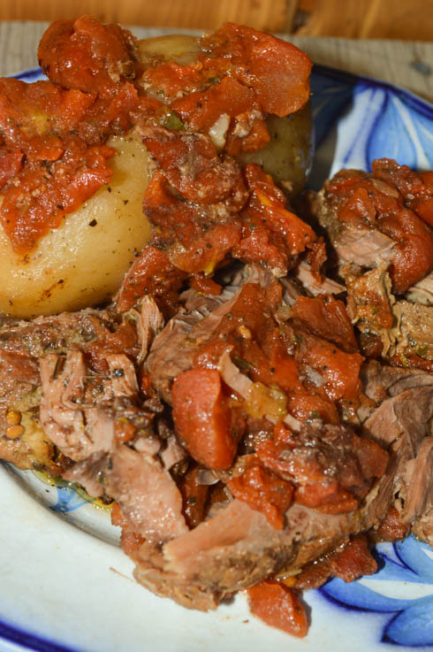 Kick up the flavor of a regular meat and potatoes dish by trying this Slow Cooker Greek Beef and Potatoes recipe with tomatoes and a Greek dressing mix.