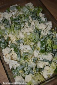 Topped with bacon and cheese and flavored with a ranch dressing mix, this Ranch Cauliflower Salad is a great side dish any night of the week. This salad featuring romaine lettuce, ranch dressing and bacon is reminiscent of the traditional seven layer salad without so many vegetables and the layers.