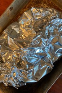 Campfire Potatoes are an easy foil packet potato recipe using aluminum foil.  Aluminum foil potatoes can be made on the grill, campfire or the oven. Since they are cooked in a foil packet, clean up is a snap.