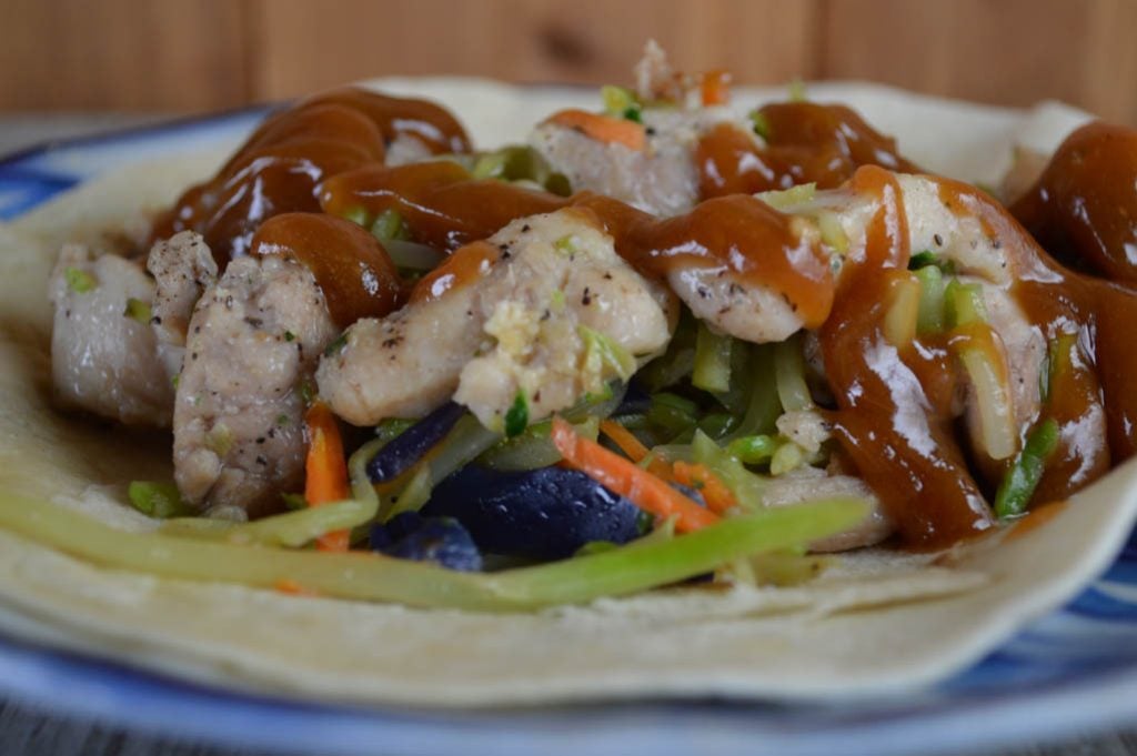 These Thai Chicken Wraps with a homemade peanut sauce and boneless chicken breasts are an easy weeknight dinner option that the entire family will love.