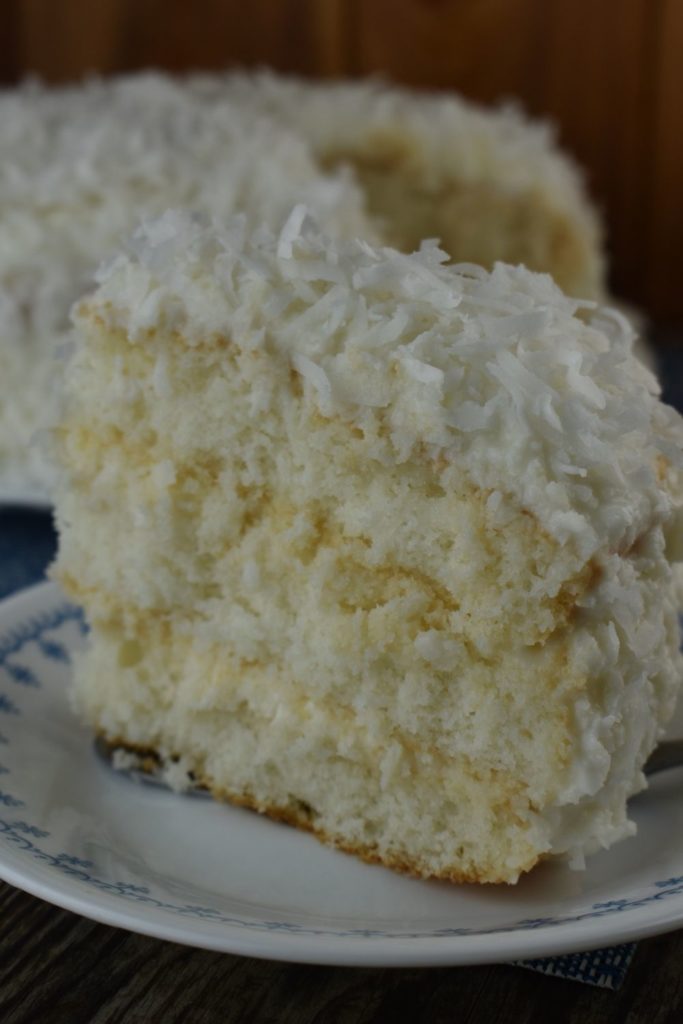 Three Day Coconut Cake with sour cream uses a boxed cake mix and just three other ingredients to make a delicious dessert for the coconut lovers in your life. Using fresh frozen, shredded coconut, this 3 day coconut cake is special.