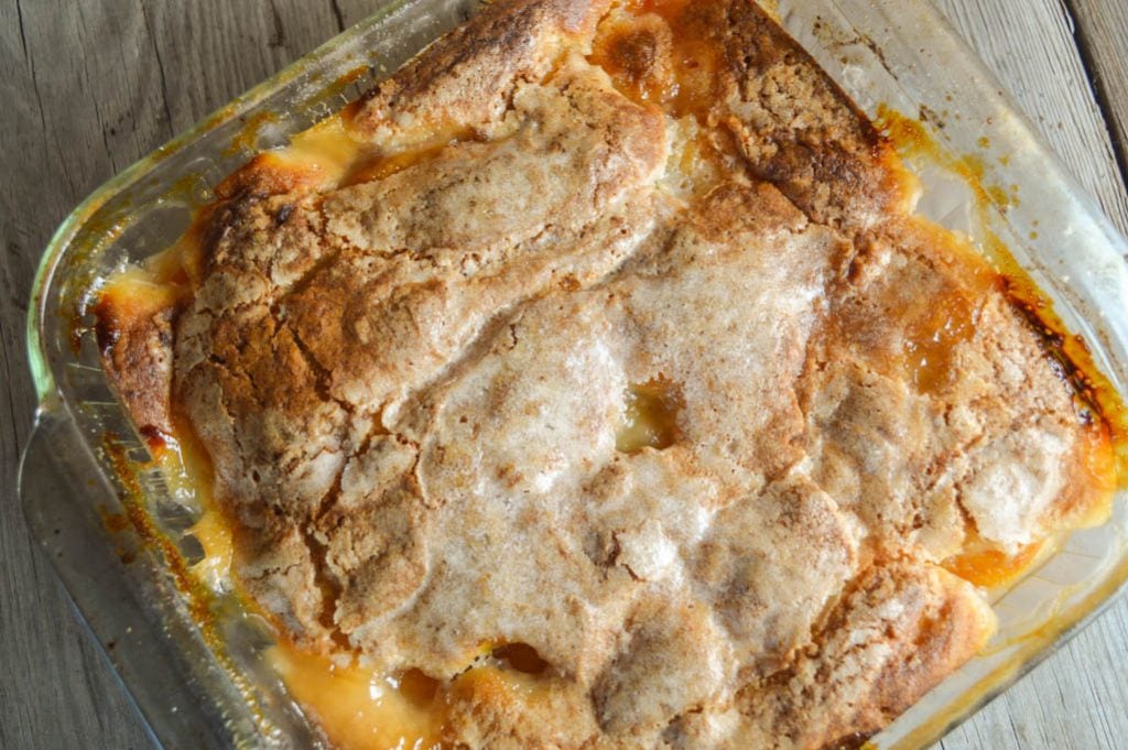 This Peach Batter Cake recipe is super easy to make with either fresh or canned peaches and has a decadent crust that will have everyone asking for seconds.