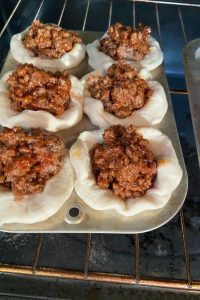 Sloppy Joe Cups have all the flavor of the classic sandwich in an easier to eat package - a biscuit - and topped with yummy cheese. This recipe for sloppy joe cups with flaky biscuits is an all-time kid favorite.
