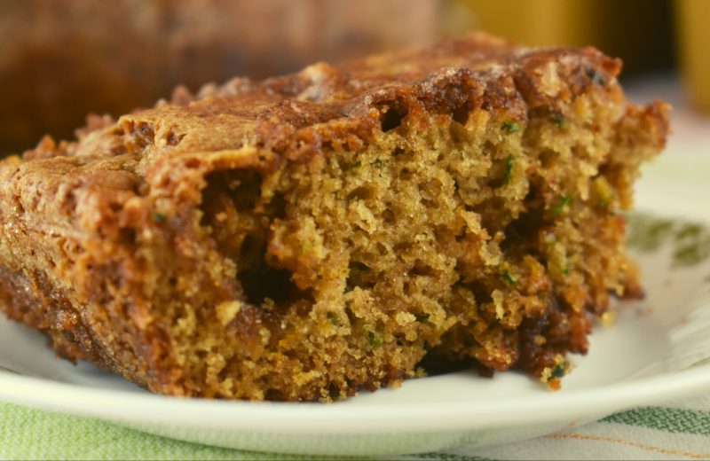 Butterscotch Zucchini Cake is an old fashioned recipe for a no frosting zucchini cake. With its crunchy, sugary topping made of butterscotch chips, cinnamon and sugar, there's no need to add a frosting.  It's a go-to option for any cookout, pitch-in or just a mid-week treat.