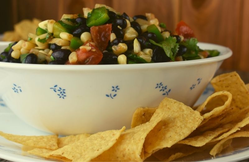 Black bean caviar salsa is a great dish served with tortilla chips.
