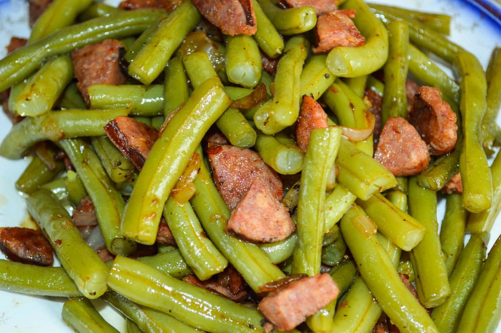 Old Fashioned Green Beans with Andouille Sausage are full of flavor and can be served as a side dish or your main dish. Use fresh or frozen green beans.