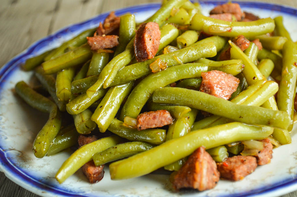 Old Fashioned Green Beans with Andouille Sausage are full of flavor and can be served as a side dish or your main dish. Use fresh or frozen green beans.