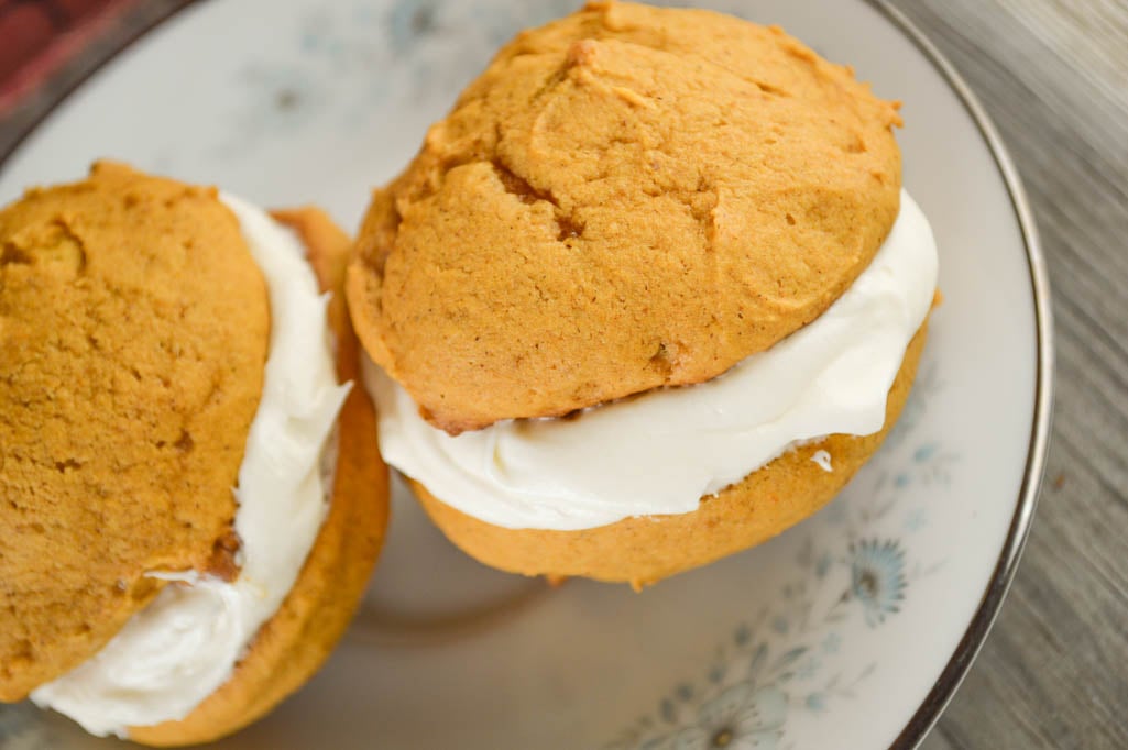 Pumpkin Whoopie Pies with a cream cheese filling are the perfect fall treat. The best part of this recipe is leave out the filling and have pumpkin cookies!
