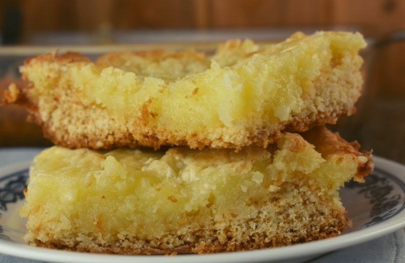 These decadent Yellow Cake Mix Gooey Bars are knock your socks off good and super easy to make with just six ingredients.