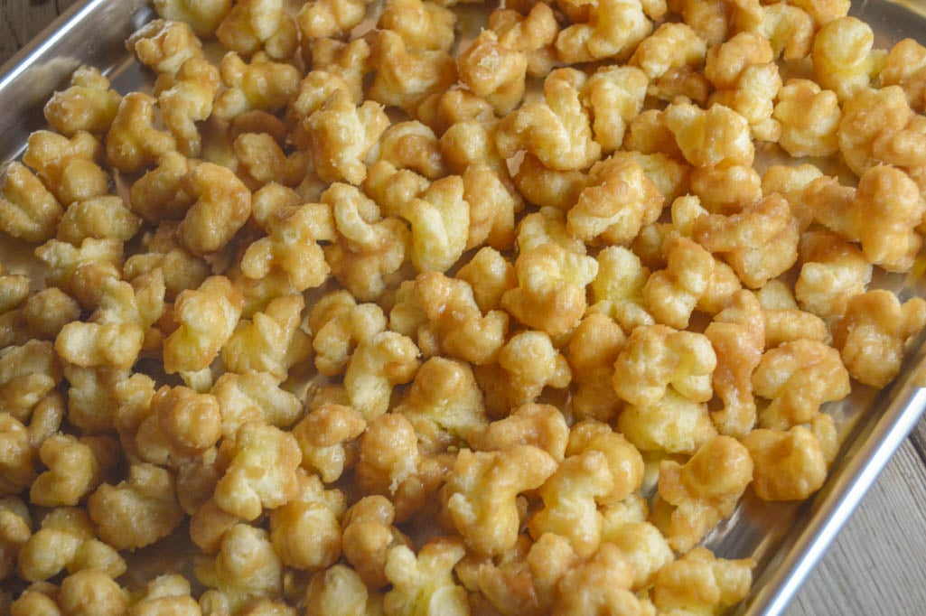 Caramel Puff Corn takes an ordinary snack food and turns into a sweet treat that you won't be able to stop yourself from eating!