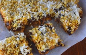 Crock Pot Seven Layer Bars is the kind of recipe you can dump in all of the ingredients, walk away, and come back to perfectly baked crock pot cookie bars. Using the slow cooker for 7 Layer Bars is an easy way to free up oven space.