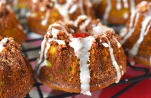 Grinch's Mini Pistachio Coffee Cakes uses a pistachio Bundt cake with sour cream recipe.  Using a mini Bundt pan or cupcake pan makes these easy to make and perfect for a special occasion like brunch, Christmas breakfast or even St. Patrick's Day!
