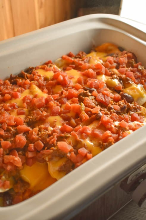 These Crock Pot Ground Beef Acapulco Enchiladas are quick to put together in a casserole crock pot and satisfy the family's need for Mexican food.