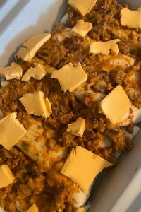 Crock Pot Ground Beef Enchiladas are a great recipe for your casserole crock pot.  With only six ingredients, ground beef enchiladas without enchilada sauce are quick to put together in a casserole slow cooker and can satisfy the family's need for Mexican food.
