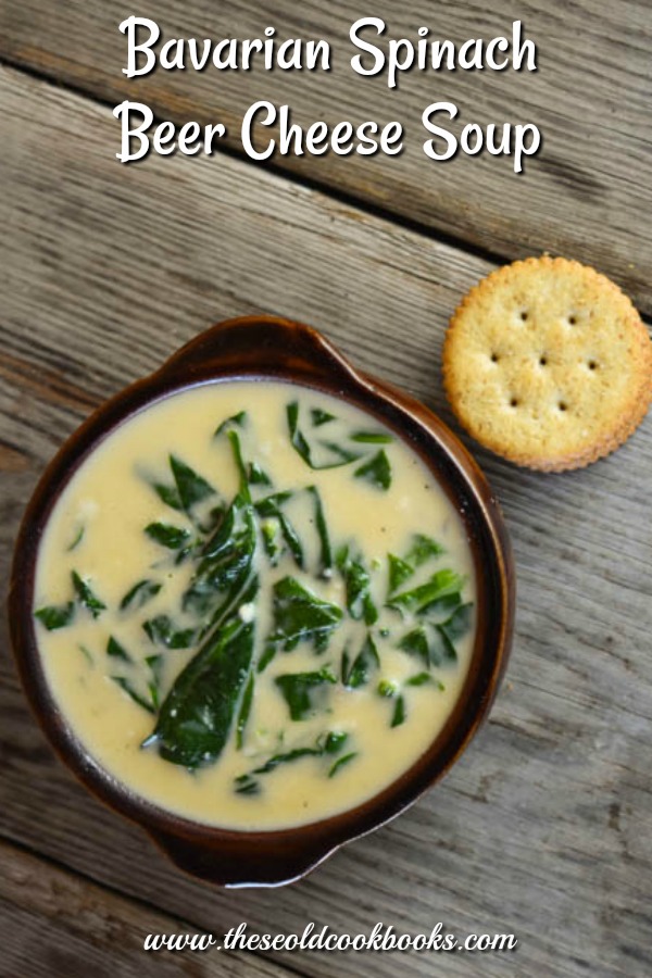 This Bavarian Spinach Beer Cheese Soup is a rich, cheesy soup full of spinach and crab. With Velveeta and Alfredo sauce, this soup is smooth and perfect served with a stack of your favorite crackers. 