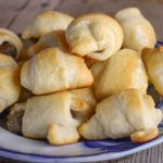These Maple Sausage Pigs in a Blanket are perfect for breakfast, brunch or your next party. Make up a double or triple batch of these finger foods and watch them disappear. Young and old alike will come back for seconds and thirds of these sweet and savory treats.