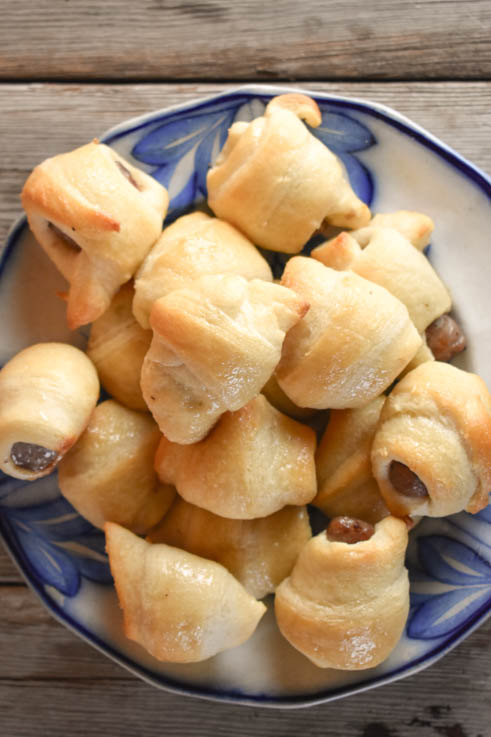 These Maple Sausage Pigs in a Blanket are perfect for breakfast, brunch or your next party. Make up a double or triple batch of these finger foods and watch them disappear. Young and old alike will come back for seconds and thirds of these sweet and savory treats.