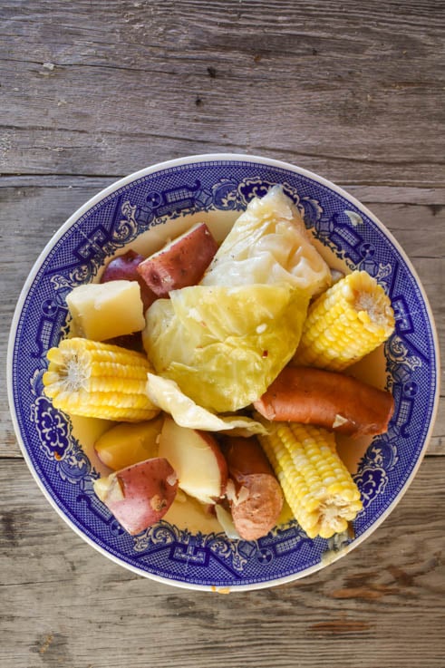 This Instant Pot Boiled Kielbasa Dinner features cabbage, potatoes and corn and is ready in less than 15 minutes. It is a perfect summer meal when sweet corn is in season that the entire family will enjoy. You can also use frozen sweet corn on the cob.