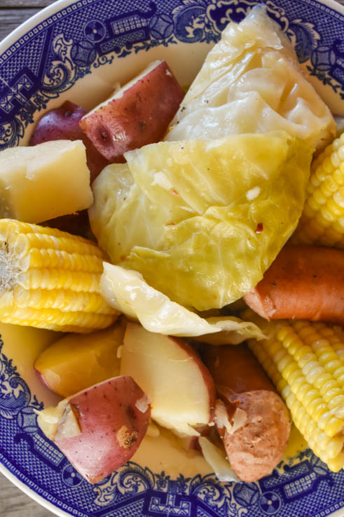 This Instant Pot Boiled Kielbasa Dinner features cabbage, potatoes and corn and is ready in less than 15 minutes. It is a perfect summer meal when sweet corn is in season that the entire family will enjoy. You can also use frozen sweet corn on the cob.