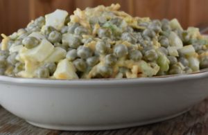 Using just one can of peas, this Old-Fashioned Pea Salad recipe is perfect for a side dish for a normal meal without too many leftovers. However, it can easily be doubled (or tripled) for cookouts and pitch-ins. This pea salad can be eaten right away or chilled for later.