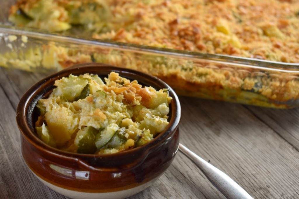 With a buttery, crunchy top, this Cheesy Summer Squash and Zucchini Casserole is a perfect side dish. 
