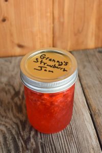 Our Grandma's Strawberry Freezer Jam recipe is quick and easy to make.  Perfect for those fresh strawberries we all enjoy during the summer months, this strawberry freezer jam is simple to put together.