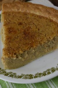 Zucchini Pie is an old fashioned recipe for a sweet zucchini pie dessert.  It reminds us of a sugar cream pie with a bit extra cinnamon. Prepared in a blender, this summertime cream pie doesn't disappoint.