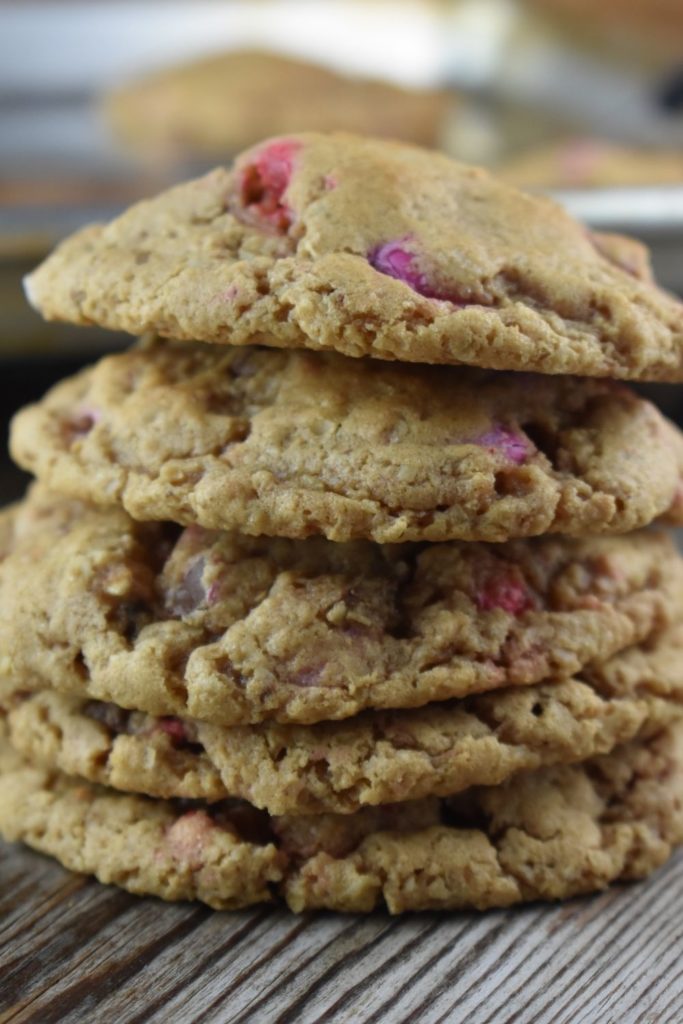 Monster Cookies Without Flour - A Leftover Candy Cookie Recipe are packed full of any kind of leftover candy available. With all of the goodness of traditional monster cookies, these use whatever candy you have sitting around your house after the holidays.