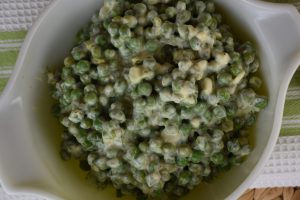 This Creamy Dill Pea Salad recipe is a refreshing side dish perfect for a pitch-in, summer picnic or just a regular family dinner. Made with frozen peas and sour cream, pea salad with dill is quick to put together and full of flavor.