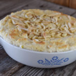 6-Ingredient Hot Crab Dip features canned crab meat, cream cheese and is topped with slivered almonds.