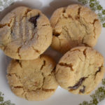 Salted Peanut Butter Cookies with Chocolate Chunks are a perfectly soft peanut butter cookie with a salty coating that complements the big chocolate chunks inside.