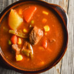 This Slow Cooker Bloody Mary Beef Vegetable Soup recipe is hearty and delicious to warm your belly on a cool winter night. It's one of the fix it and forget it recipes that will be ready to eat after a long day at work. 