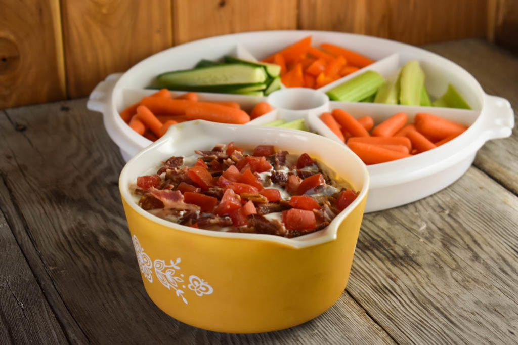 Tired of the same old vegetable dip? Try this Easy BLT dip featuring four simple ingredients and everyone will be piling their plates with veggies! Â