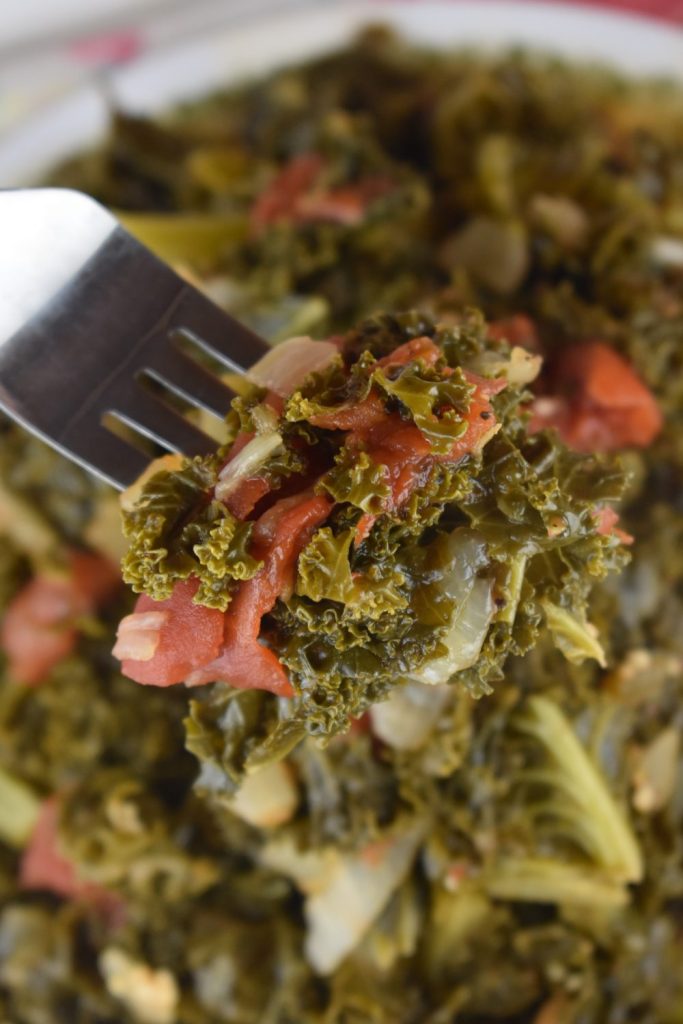 Instant Pot Tomato Braised Kale is a healthy side dish that takes just minutes to make. Braising the kale with tomatoes and onions gives it a tender texture. Follow these simple instructions for how to cook kale greens in an instant pot.