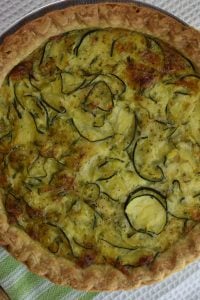 Zucchini Quiche is a great dish year round, but especially when the zucchini is plentiful from the garden or farmers' market. This easy zucchini quiche recipe, made with homemade crust, frozen pie crust or crustless, can be a great breakfast or brunch option.