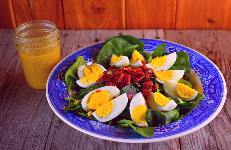 This Classic Spinach Salad consists of only three simple ingredients - fresh spinach, bacon and hard boiled eggs - and our homemade vinaigrette dressing..  The combination of these ingredients is not only gorgeous but a match made in heaven.  This salad pairs perfectly with a simple homemade vinaigrette dressing of red wine vinegar, Dijon mustard, olive oil, salt and pepper. 