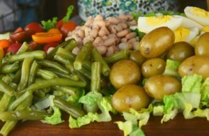 French Dinner Salad is a classic French bistro salad with romaine lettuce, hard-boiled eggs, tomatoes, green beans, potatoes and Great Northern beans.