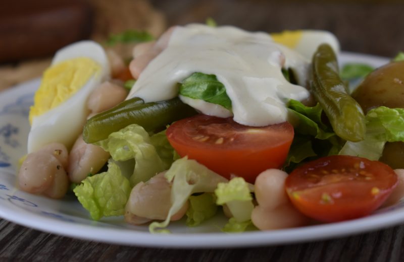 This salad won't break the calorie bank with Low-Fat Cottage Cheese Dressing. It is the perfect accompaniment to this hearty French-inspired dinner salad. The dressing is made of ingredients that we typically have on hand including cottage cheese, Dijon mustard, canned evaporated milk, vinegar and salt.