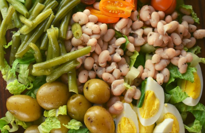 Green beans, great northern beans, potatoes and hard boiled eggs are all part of this classic French Dinner Salad.