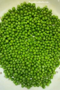 Old-Fashioned Creamed Peas uses frozen peas that is jazzed up with a white sauce made of butter, half and half and flour.