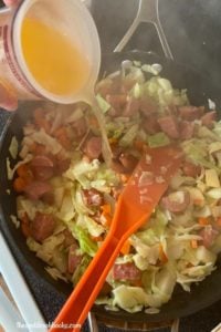 Skillet Smoked Sausage and Cabbage is a quick meal consisting of a buttery blend of cabbage, sausage, potato.