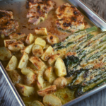 Sheet Pan Ranch Chicken and Vegetables features thinly pounded pieces of chicken (breast or thigh), diced potatoes and stalks of asparagus dressed in a delicious ranch sauce baked on a single sheet pan.  It's a one pan plan in less than thirty minutes. 