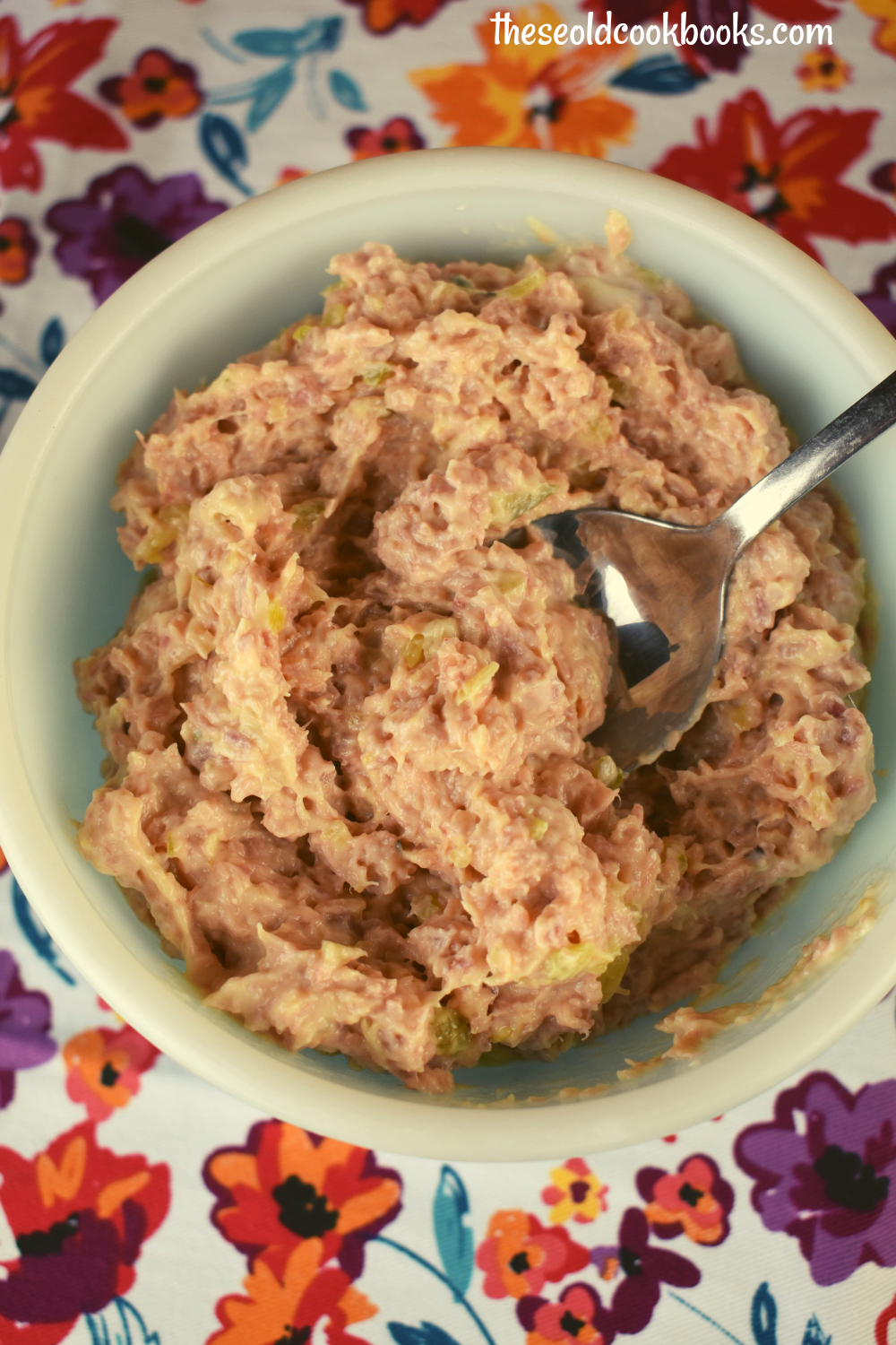 Old Fashioned Ham Salad Spread is just 5 simple ingredients that will take you right back to your childhood---leftover baked ham, miracle whip, yellow mustard, sweet pickle relish and sugar. Served on a sandwich or crackers, it's always a hit. 