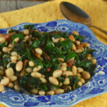 Sauteed Swiss Chard and White Beans is an Italian-inspired side dish that comes together quickly with only 4 ingredients---Swiss chard, olive oil, garlic and white beans.