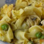 This classic chicken noodle casserole with a crunchy potato chip topping will take you right back to your childhood.  Easy Chicken Noodle Casserole with Potato Chips is quick and simple, and your family will give it two thumbs up.